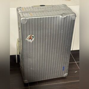 Vintage Rimowa Silver Aluminum Hard-Shell Rolling Suitcase Check on